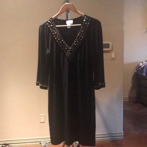 Black dress with gold stones along neckline